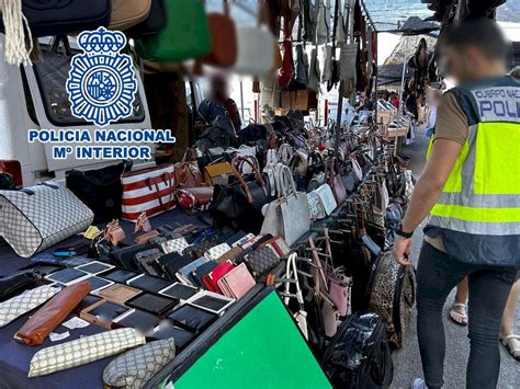 malaga fake clothes|Tourists conned by Benidorm market traders selling thousands of fake .